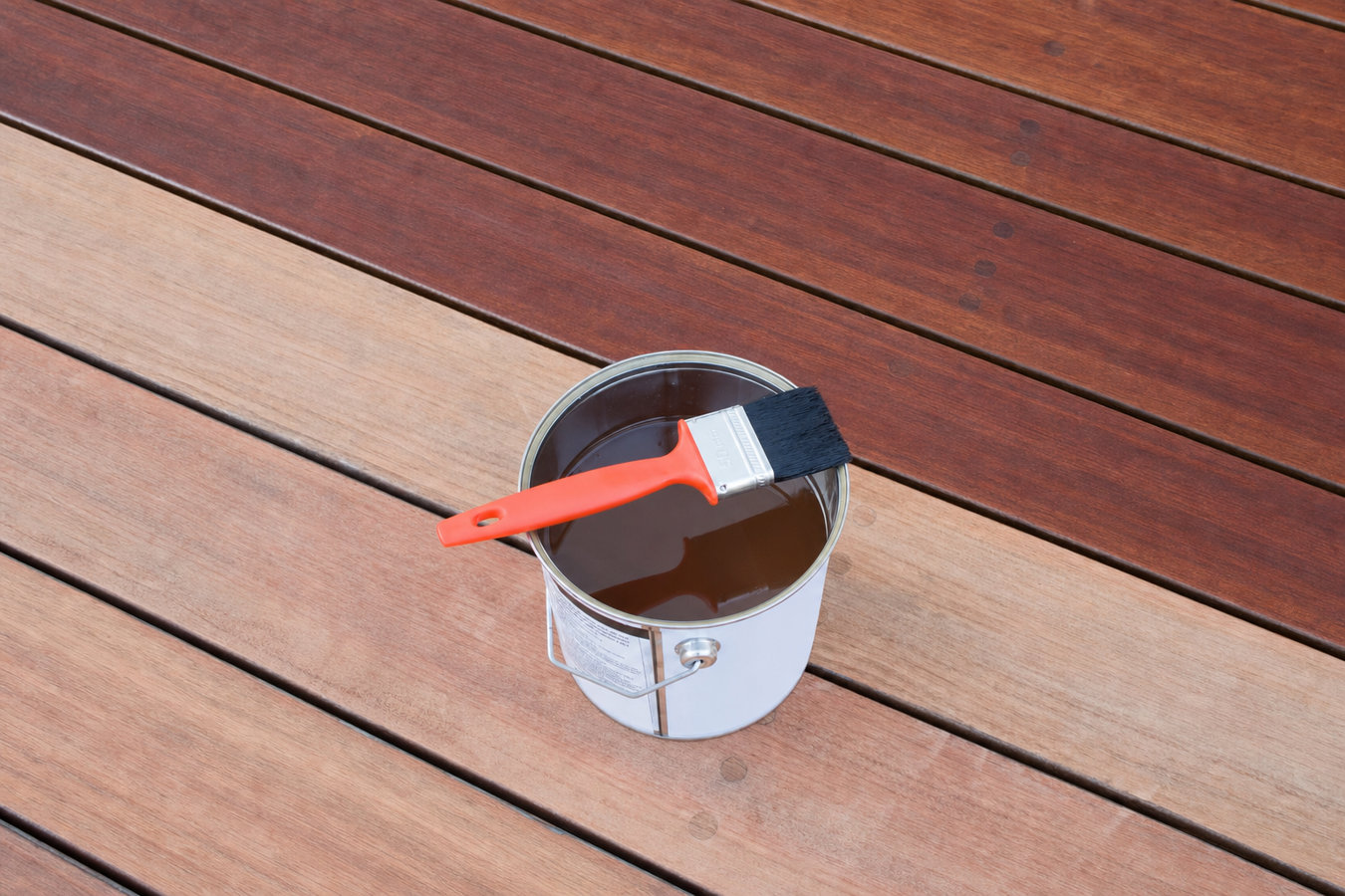 Fence staining and sealing